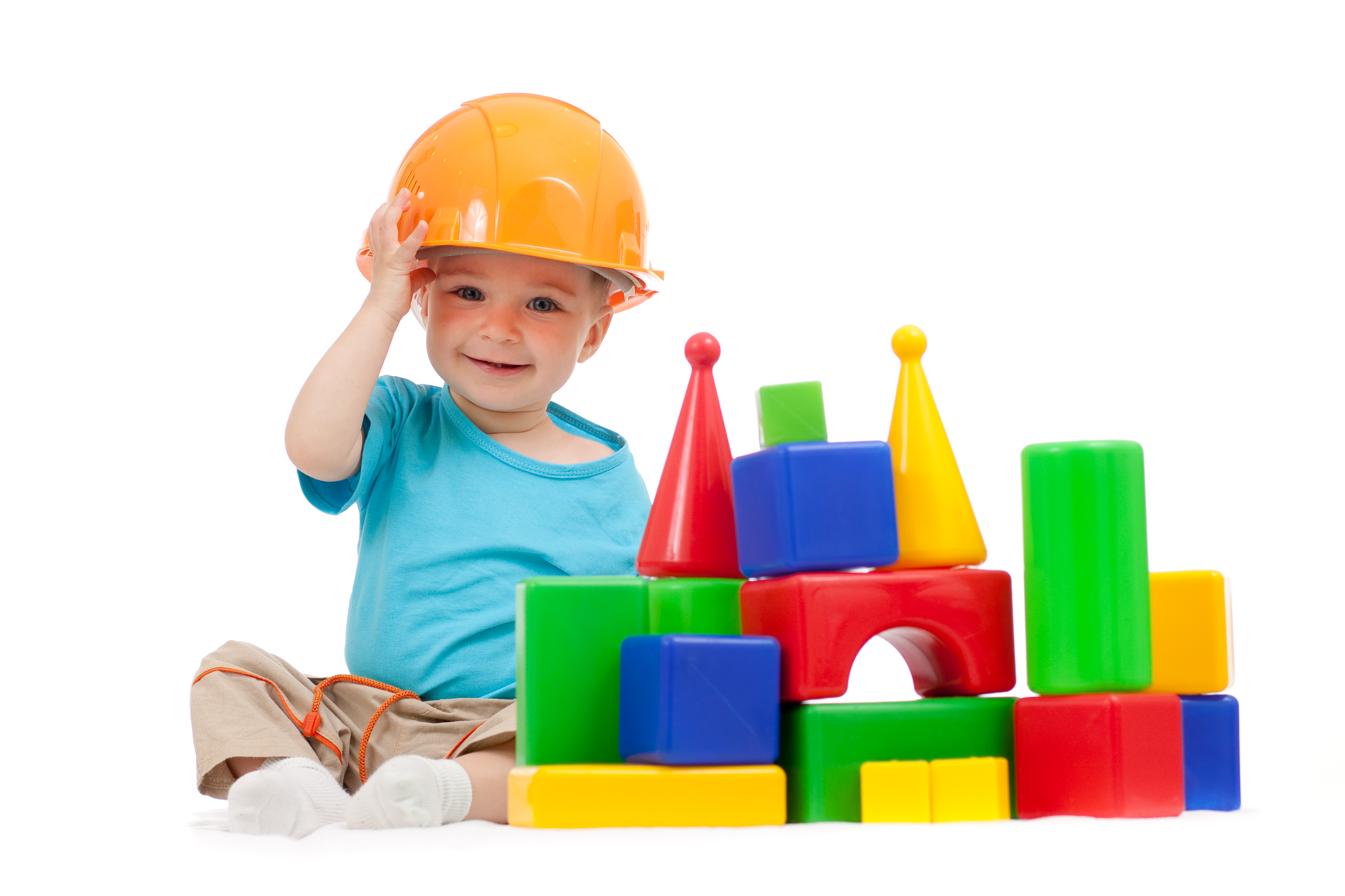little boy with hard hat and building blocks